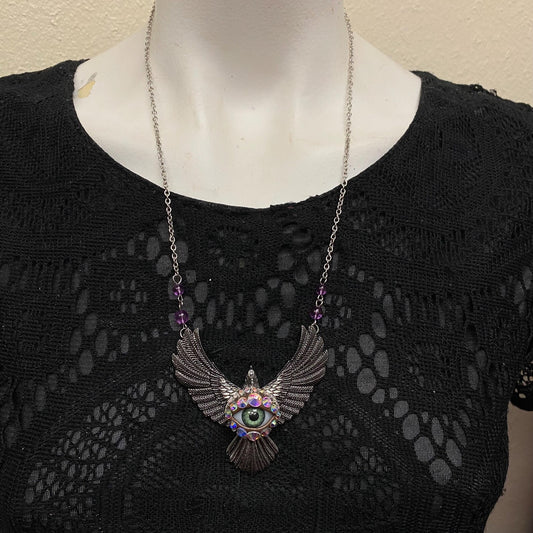 Silver Tone Bird Eye Necklace with Purple Accents, 20-22" Chain