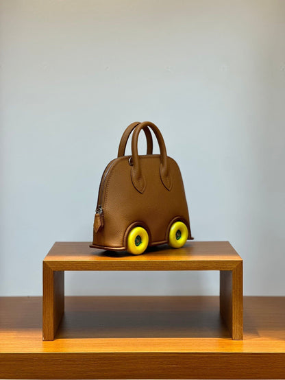 HM Bolide Mini 19cm Gold Epsom Leather on Yellow Wheels