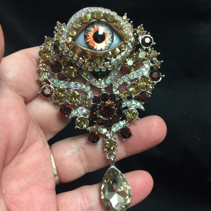 Vintage Ornate Eyeball Brooch: Amber Glass Iris, Rhinestones