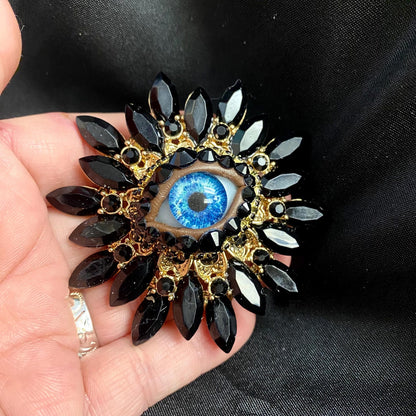 Vintage Style Sunburst Brooch: Jet Black Rhinestones with Handmade Blue Glass Iris