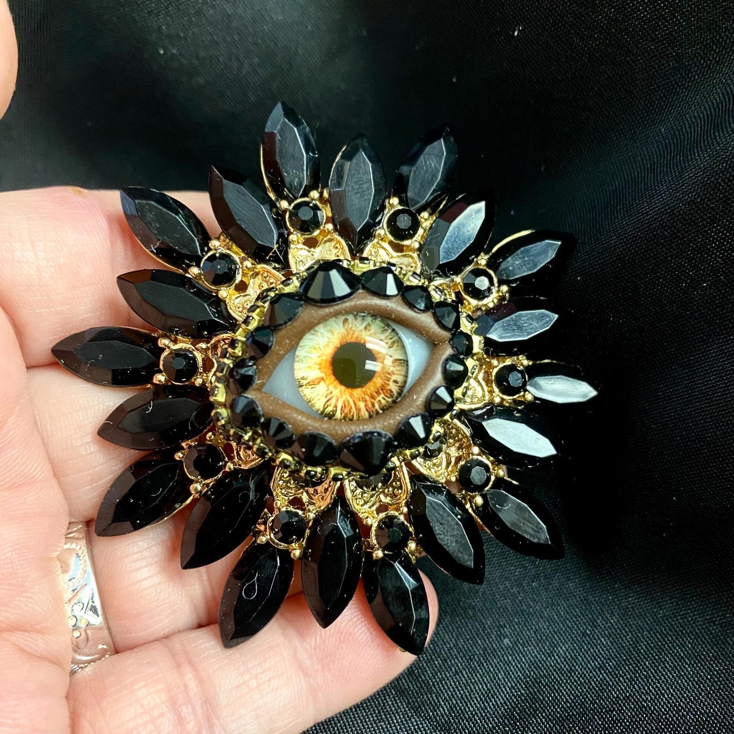 Vintage Style Sunburst Eyeball Brooch, Black Rhinestone Amber Glass Iris