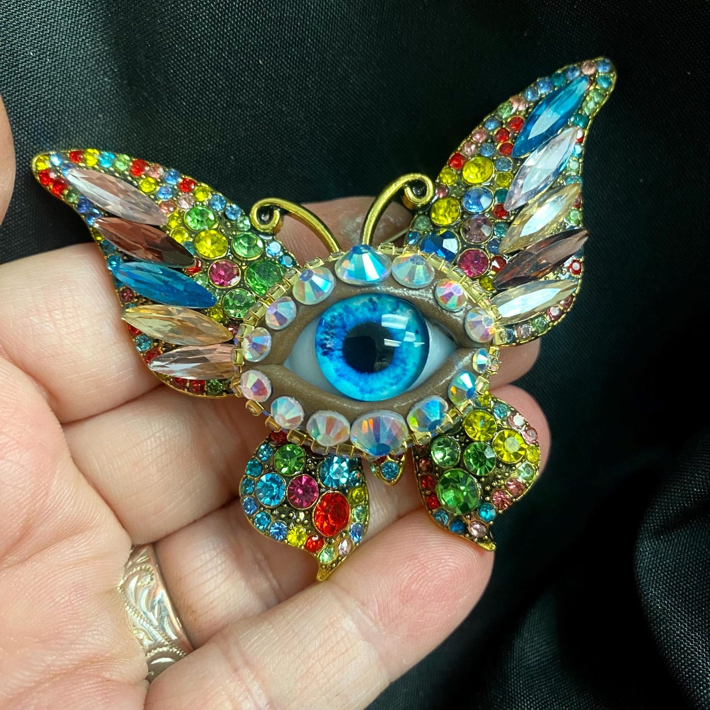 Surreal Evil Eye Butterfly Brooch | Aqua Blue Glass Iris Pin
