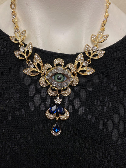 Gold Tone Eyeball Necklace and Earrings Set with Blue Crystals – Statement Jewelry