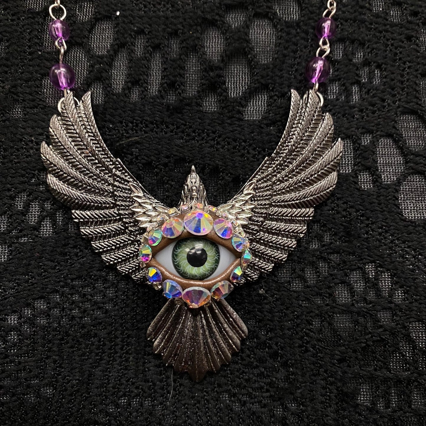 Silver Tone Bird Eye Necklace with Purple Accents, 20-22" Chain