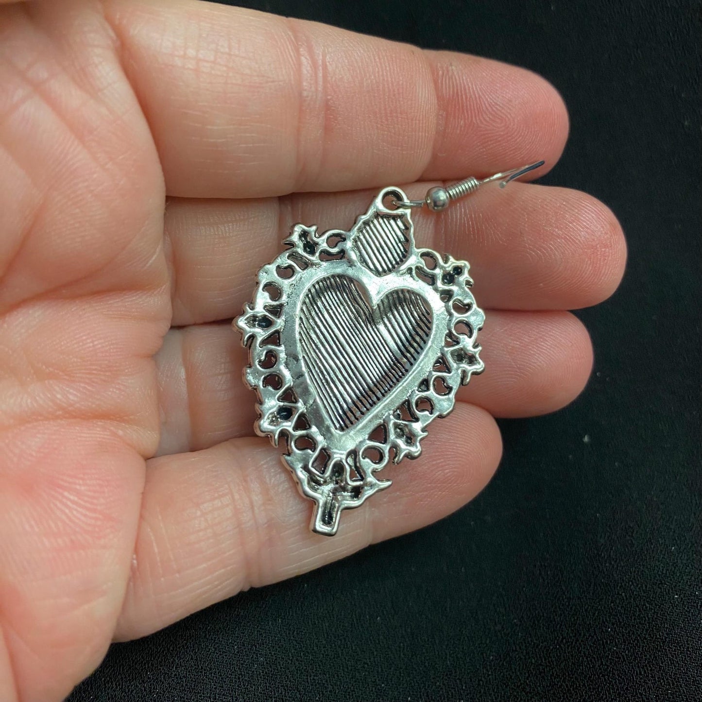 Silver Tone Sacred Heart Eyeball Earrings with Skull Accents