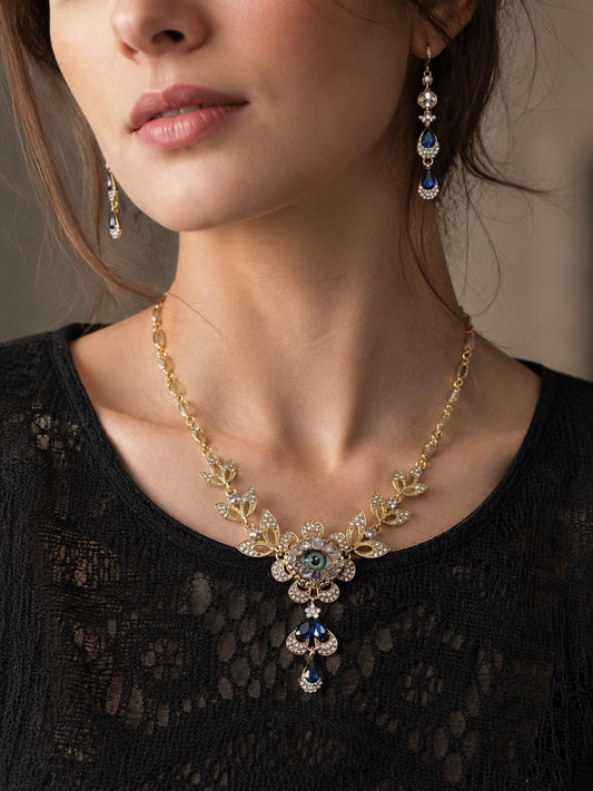 Gold Tone Eyeball Necklace and Earrings Set with Blue Crystals – Statement Jewelry