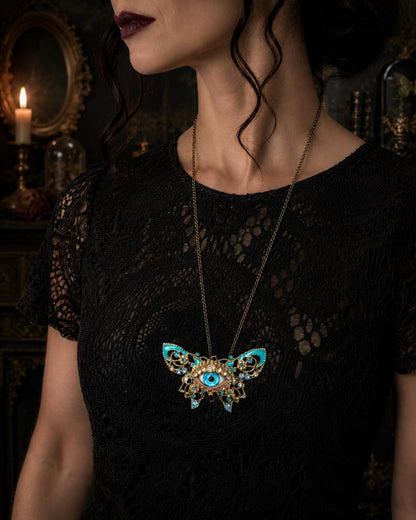 Surreal Evil Eye Butterfly Necklace | Blue Glass Eye Pendant