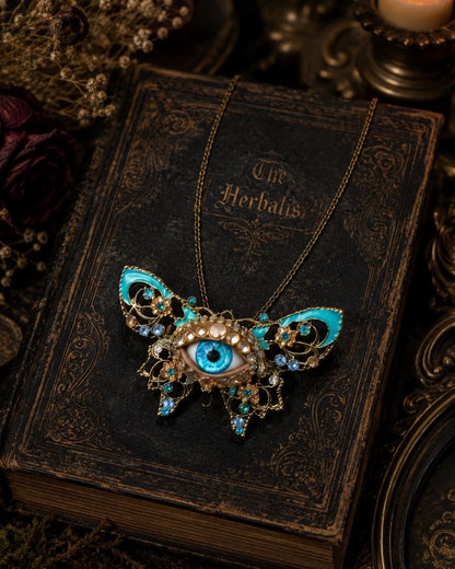 Surreal Evil Eye Butterfly Necklace | Blue Glass Eye Pendant