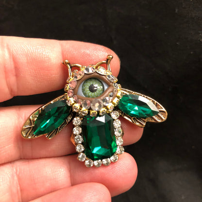 Little Baby Bee! Bejeweled Emerald Green Insect Eyeball Art Brooch with a Natural Green Eye and and Hand Placed Rhinestones!