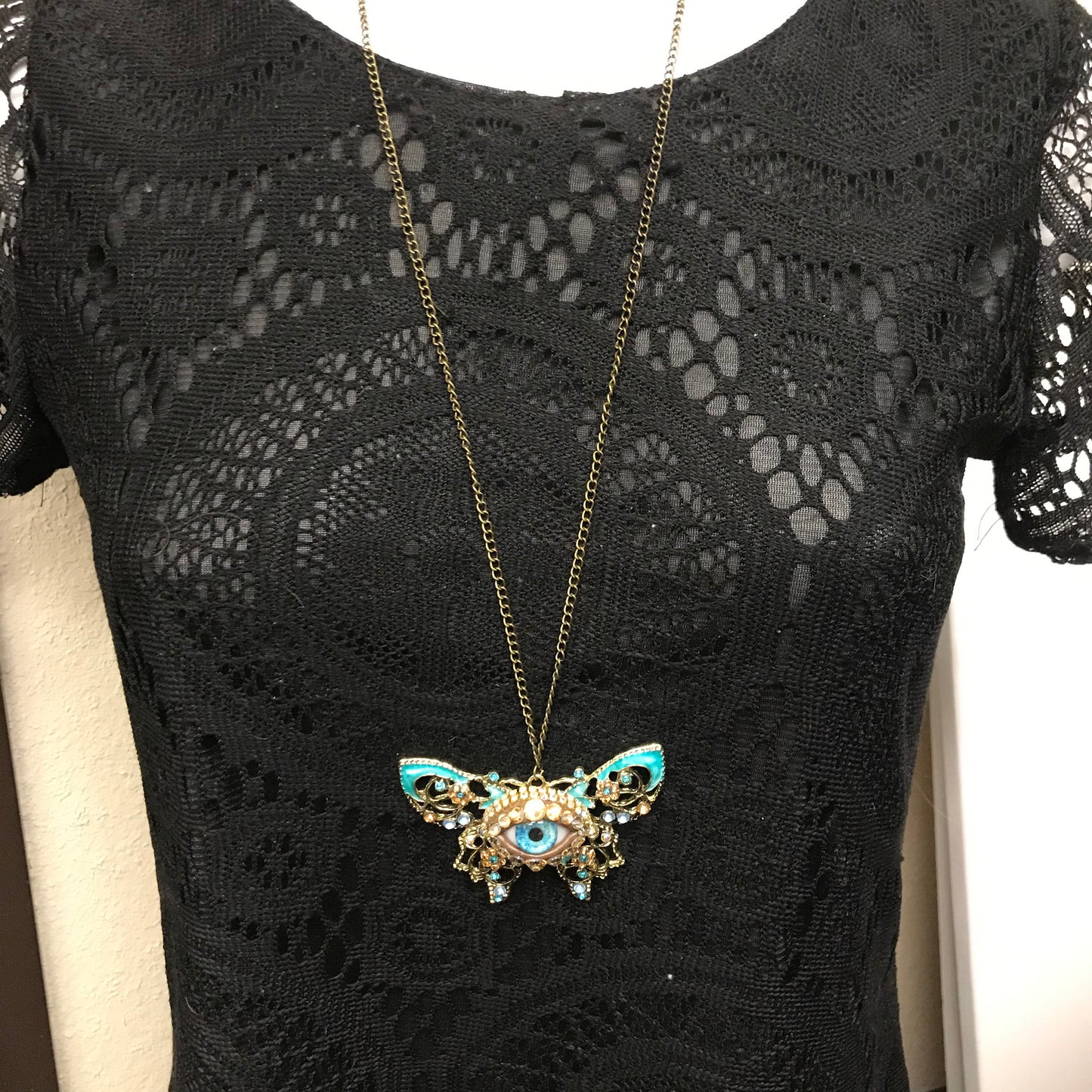 Surreal Evil Eye Butterfly Necklace | Blue Glass Eye Pendant