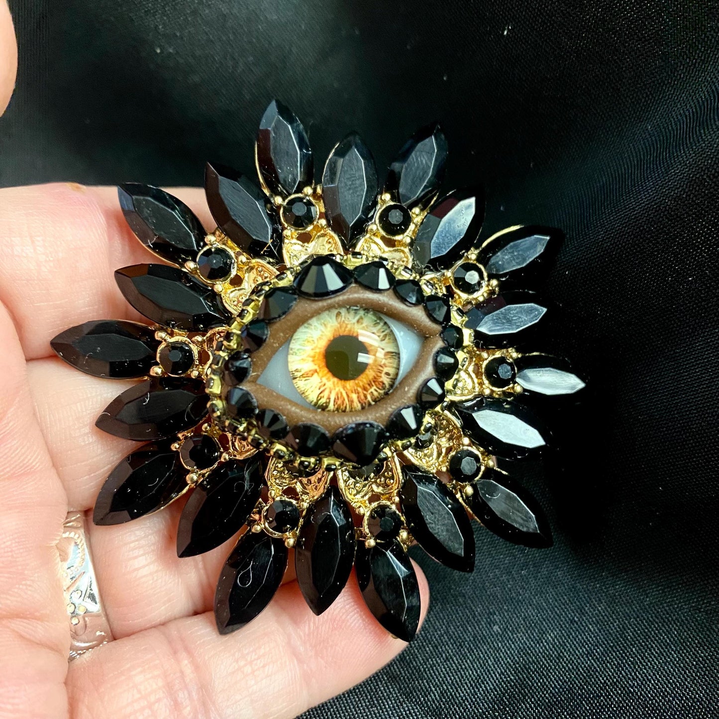 Vintage Style Sunburst Eyeball Brooch, Black Rhinestone Amber Glass Iris