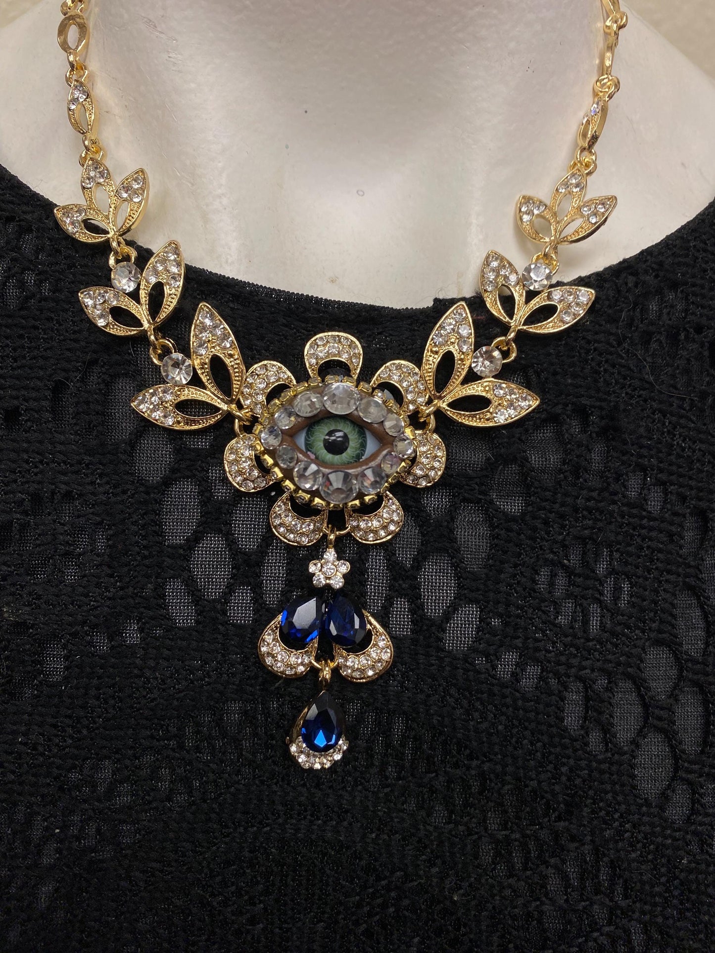 Gold Tone Eyeball Necklace and Earrings Set with Blue Crystals – Statement Jewelry