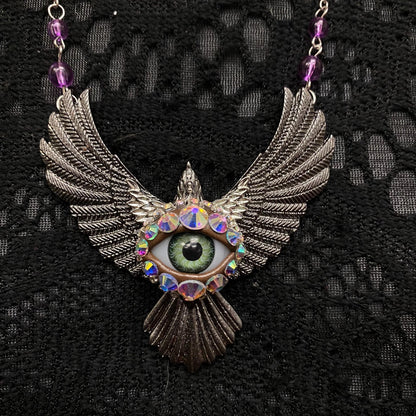 Silver Tone Bird Eye Necklace with Purple Accents, 20-22" Chain